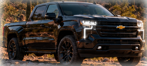 Black pickup truck in Arizona sunset scenery